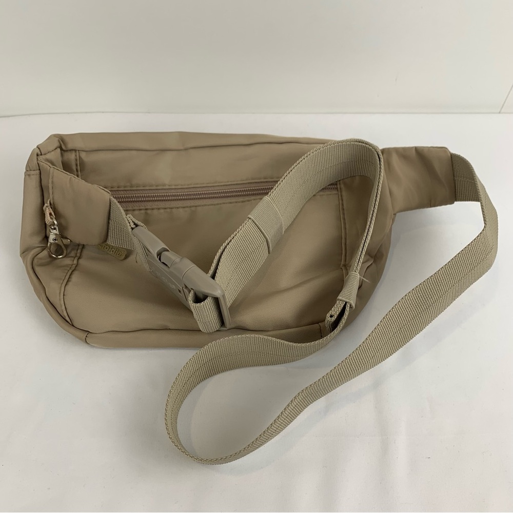 NWOT The Foldie Crossbody Travel Bag Taupe Beige RFID Safe Cut-Proof Strap - Picture 11 of 11